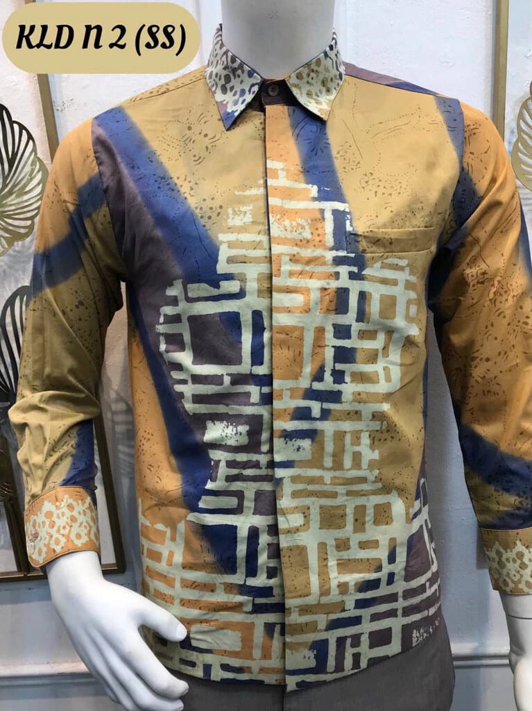 Men's long-sleeve batik shirt KLP N 2 in mustard, blue and cream, on a mannequin