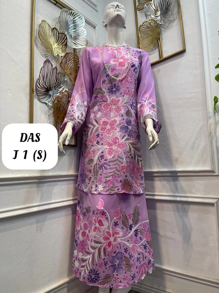 Women's silk crepe batik baju kurung moden DAS J 1 in lilac, pink and purple, on a mannequin