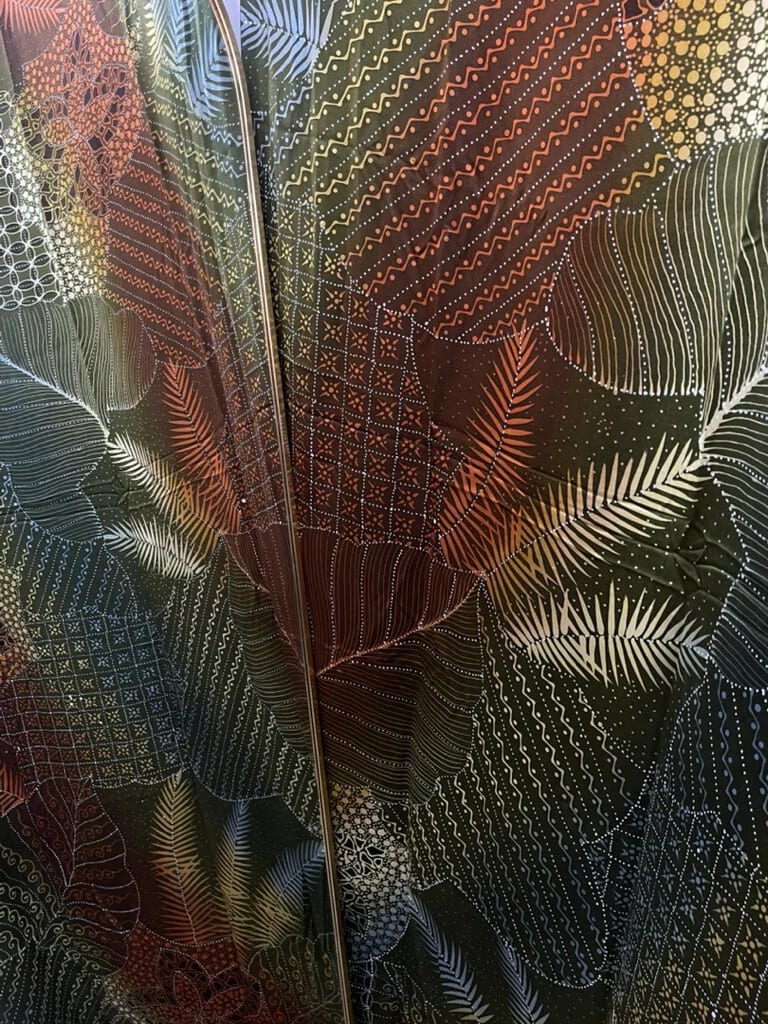 Fabric MD 1 laid out, showing the hand-drawn leaves and geometric panels