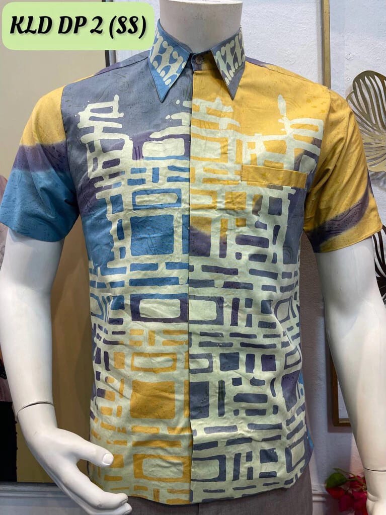 Men's short-sleeve batik shirt KLD DP 2 in blue, mustard and cream, on a mannequin