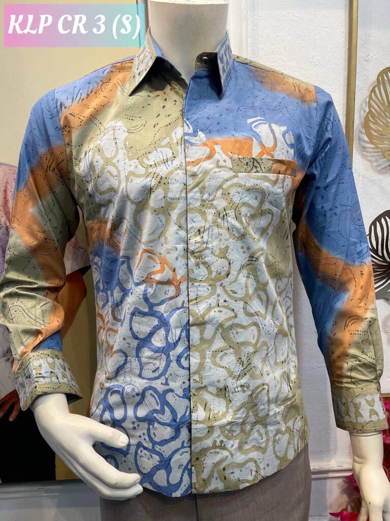 Men's long-sleeve batik shirt KLP CR 3 in blue, orange and khaki, on a mannequin