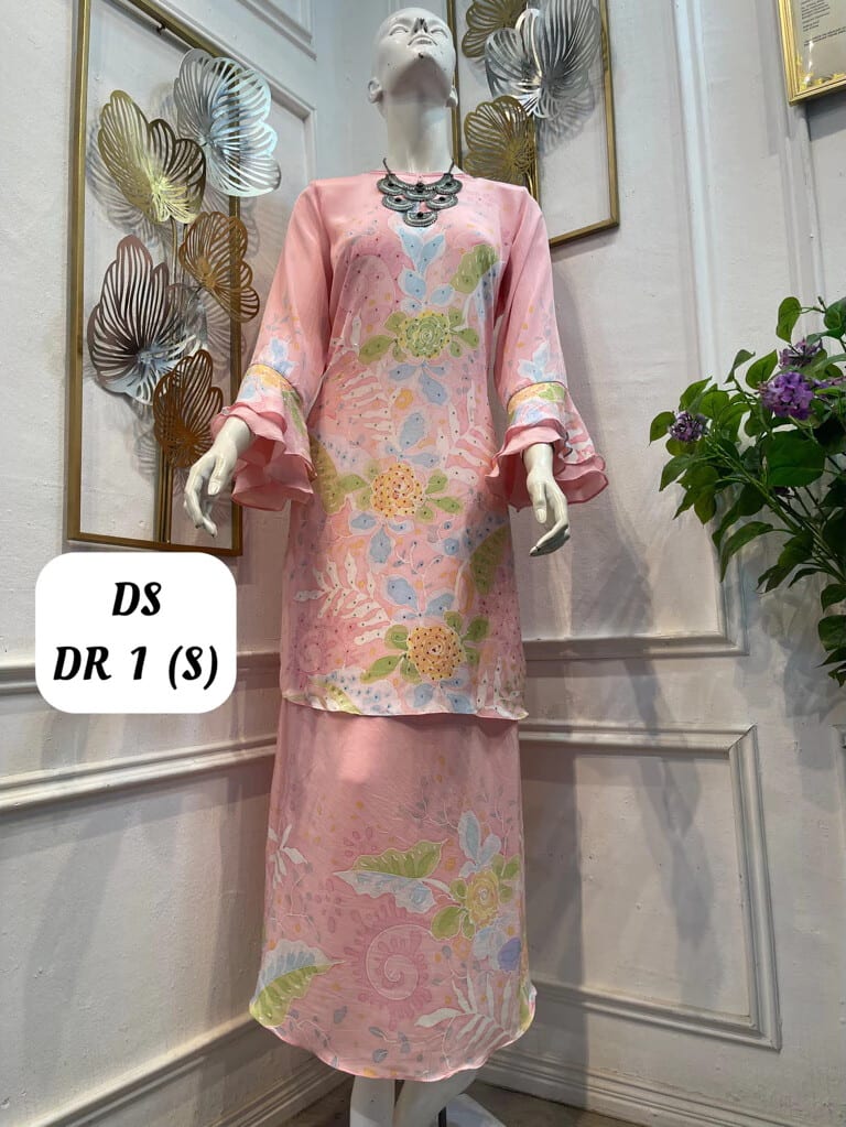 Women's silk crepe batik baju kurung moden DS DR 1 in salmon pink, light blue, light green and yellow, on a mannequin