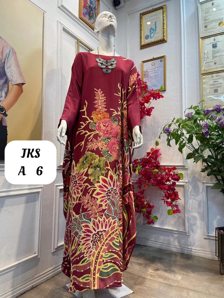Women's silk crepe batik kaftan JKS A 6 in maroon, pink, yellow and green, on a mannequin