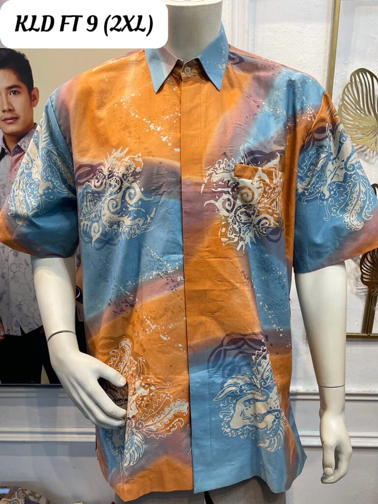 Men's short-sleeve batik shirt KLD FT 9 in orange, light blue and cream, on a mannequin