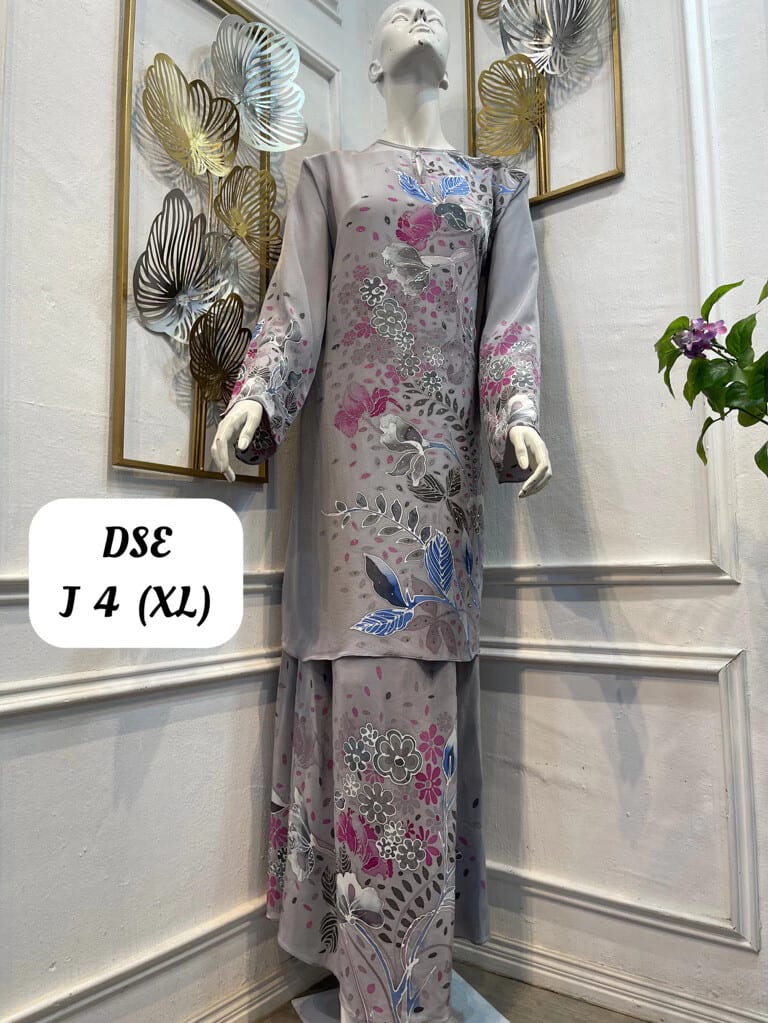 Women's silk crepe batik baju kurung moden DSE J 4 in grey, pink and blue, on a mannequin