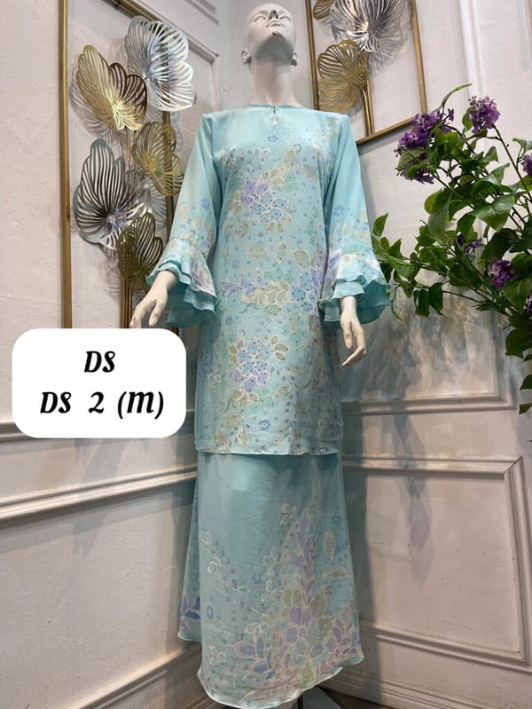 Women's silk crepe batik baju kurung moden DS DS 2 in mint blue, lilac and pale green, on a mannequin