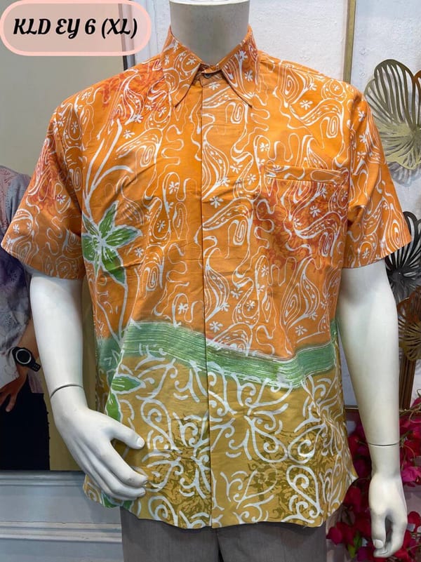 Men's short-sleeve batik shirt KLD EY 6 in orange, mustard and green, on a mannequin