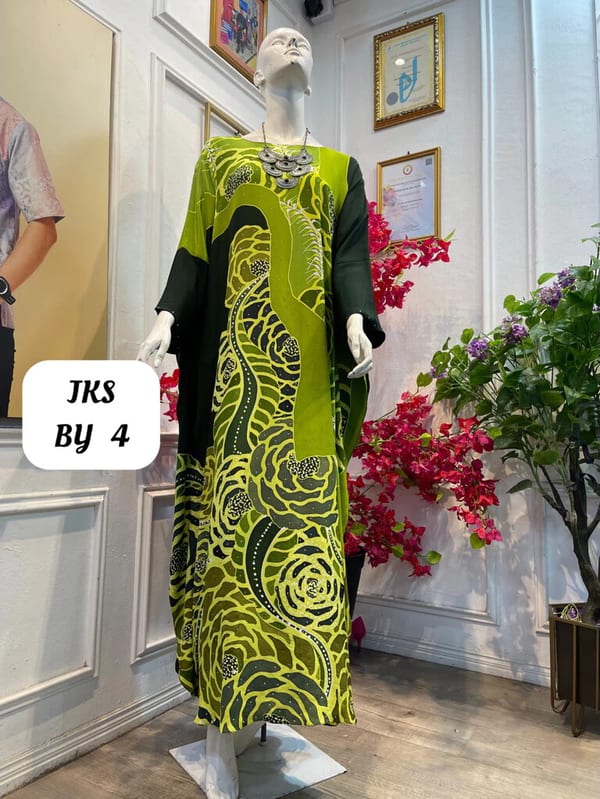 Women's silk crepe batik kaftan JKS BY 4 in lime green and dark green, on a mannequin