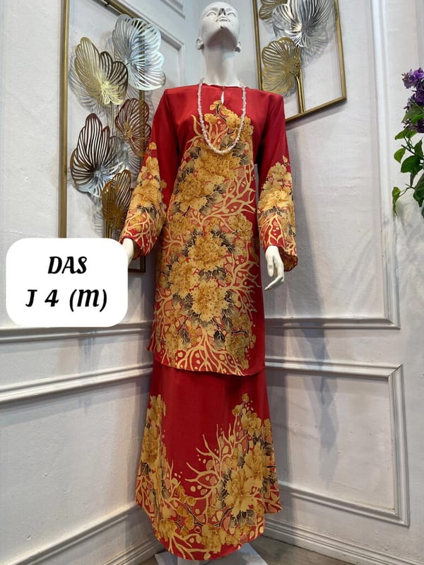Women's silk crepe batik baju kurung moden DAS J 4 in red and gold, on a mannequin