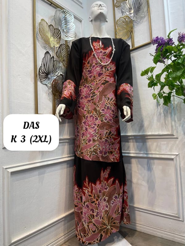 Women's silk crepe batik baju kurung moden DAS K 3 in black, pink and red, on a mannequin