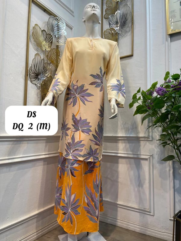 Women's silk crepe batik baju kurung moden DS DQ 2 in cream, orange and purple, on a mannequin