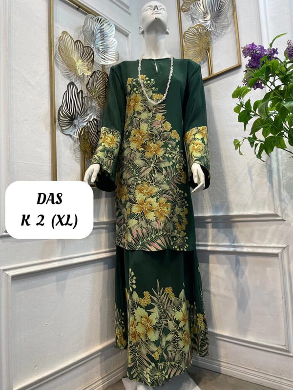Women's silk crepe batik baju kurung moden DAS K 2 in dark green and yellow, on a mannequin
