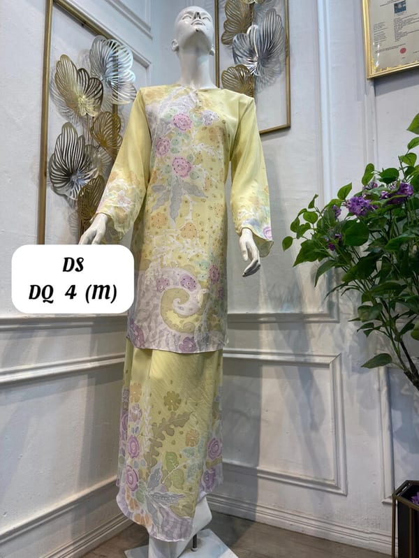 Women's silk crepe batik baju kurung moden DS DQ 4 in pale yellow, pink, lilac and pale green, on a mannequin