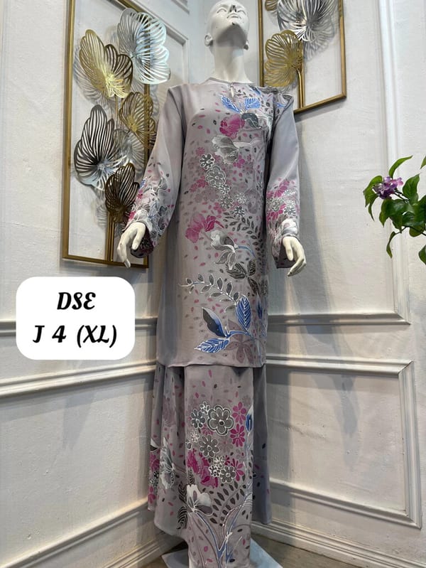 Women's silk crepe batik baju kurung moden DSE J 4 in grey, pink and blue, on a mannequin